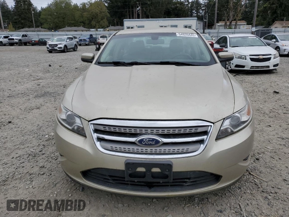 2011 Ford Taurus SEL z VIN 1FAHP2HW4BG171787, wystawiony jako Copart lot #54939445 z przebiegiem 125 882 mil mil oraz Czysty tytuł • Clean title. Historia ofert i sprzedaży dostępna na DreamBid. Obrazek 5.