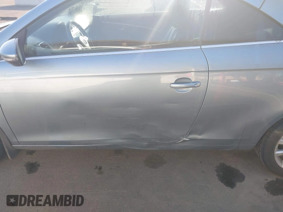 2012 Volkswagen Eos Komfort with VIN WVWBW7AH1CV022066, listed as a IAAI auction lot 41950391 with 98,877 mi miles and . Bid and sale history available at DreamBid. Image 6.