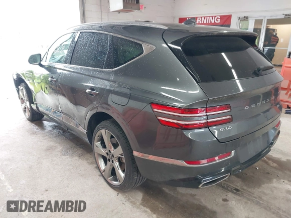 2023 Genesis GV80 with VIN KMUHBDSBXPU112470, listed as a IAAI auction lot 42326878 with 28,302 mi miles and . Bid and sale history available at DreamBid. Image 3.