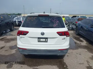 2018 Volkswagen Tiguan SEL with VIN 3VV2B7AX3JM199908, listed as a IAAI auction lot 42498185 with 58,540 mi miles and . Bid and sale history available at DreamBid. Image 15.