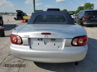 2003 Mazda MX-5 Miata Cloth with VIN JM1NB353230312510, listed as a Copart auction lot 54925895 with 141,391 mi miles and Salvage Title. Bid and sale history available at DreamBid. Image 6.