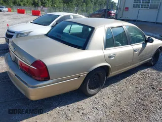 1999 Mercury Grand Marquis GS z VIN 2MEFM74W6XX626426, wystawiony jako IAAI lot #42231219 z przebiegiem 121 406 mil mil oraz . Historia ofert i sprzedaży dostępna na DreamBid. Obrazek 4.