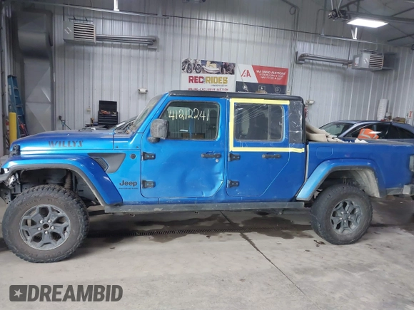 2021 Jeep Gladiator Willys with VIN 1C6HJTAG9ML535479, listed as a IAAI auction lot 41212241 with 81,044 mi miles and . Bid and sale history available at DreamBid. Image 15.