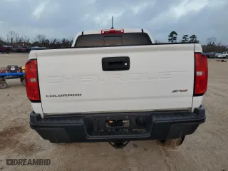 2021 Chevrolet Colorado 4WD ZR2 with VIN 1GCGTEEN8M1285957, listed as a Copart auction lot 44404555 with 55,615 mi miles and Salvage Title. Bid and sale history available at carsss.com. Image 6.
