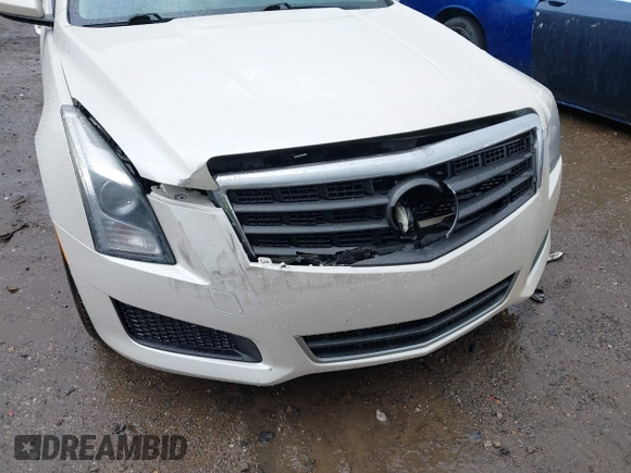 2013 Cadillac ATS z VIN 1G6AA5RX9D0156125, wystawiony jako IAAI lot #41964124 z przebiegiem 139 869 mil mil oraz . Historia ofert i sprzedaży dostępna na DreamBid. Obrazek 6.