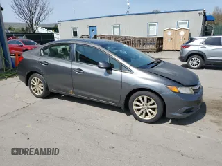 2012 Honda Civic EX with VIN 2HGFB2F83CH311453, listed as a Copart auction lot 55051765 with 242,944 mi miles and Salvage Title. Bid and sale history available at DreamBid. Image 4.