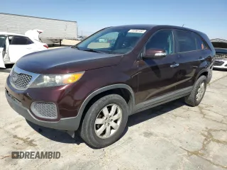 2012 Kia Sorento LX z VIN 5XYKT4A11CG243216, wystawiony jako Copart lot #72256154 z przebiegiem 161 265 mil mil oraz Szkoda całkowita • Salvage title. Historia ofert i sprzedaży dostępna na DreamBid. Obrazek 1.