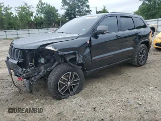 2017 Jeep Grand Cherokee Trailhawk with VIN 1C4RJFLG7HC674060, listed as a Copart auction lot 61130225 with 79,351 mi miles and Salvage title. Bid and sale history available at DreamBid. Image 1.