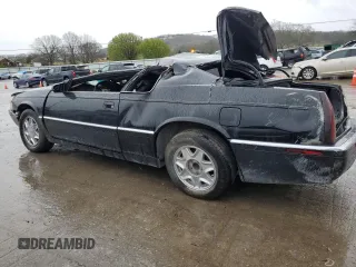 2000 Cadillac Eldorado z VIN 1G6EL12Y7YU190697, wystawiony jako Copart lot #70741434 z przebiegiem Nie podano mil oraz Szkoda całkowita • Salvage title. Historia ofert i sprzedaży dostępna na DreamBid. Obrazek 2.