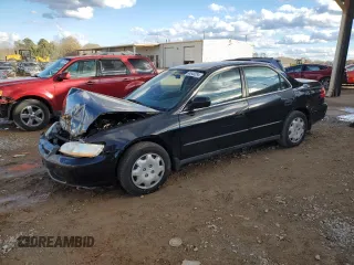 2000 Honda Accord LX with VIN 1HGCG564XYA077255, listed as a Copart auction lot 84643384 with 329,506 mi miles and Salvage title. Bid and sale history available at DreamBid. Image 1.
