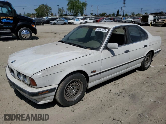1995 BMW 5 Series 525i z VIN WBAHD6324SGK57242, wystawiony jako Copart lot #57287605 z przebiegiem Nie podano mil oraz Czysty tytuł • Clean title. Historia ofert i sprzedaży dostępna na DreamBid. Obrazek 1.