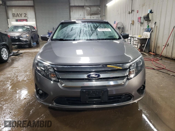 2012 Ford Fusion SE z VIN 3FAHP0HG5CR392483, wystawiony jako Copart lot #48069745 z przebiegiem 155 171 mil mil oraz Szkoda całkowita • Salvage title. Historia ofert i sprzedaży dostępna na DreamBid. Obrazek 5.