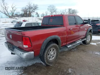 2012 Ram 2500 Laramie Longhorn with VIN 3C6UD5GLXCG236438, listed as a IAAI auction lot 41718933 with 139,564 mi miles. Bid and sale history available at carsss.com. Image 4.