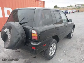 1999 Toyota RAV4 with VIN JT3HP10V5X7120186, listed as a IAAI auction lot 41909578 with 257,200 mi miles. Bid and sale history available at carsss.com. Image 4.