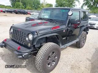 2018 Jeep Wrangler Rubicon Recon with VIN 1C4BJWCG6JL814834, listed as a IAAI auction lot 42327297 with 59,623 mi miles and . Bid and sale history available at DreamBid. Image 2.