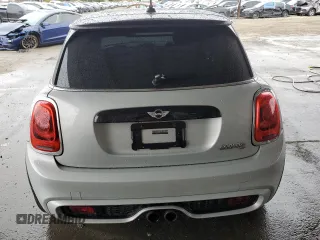 2014 MINI Hardtop S with VIN WMWXM7C57ET985421, listed as a Copart auction lot 49443335 with 76,168 mi miles and Salvage Title. Bid and sale history available at DreamBid. Image 6.