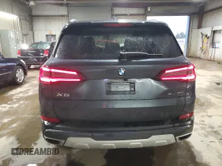 2021 BMW X5 xDrive40i with VIN 5UXCR6C00M9G00599, listed as a Copart auction lot 51536795 with 55,422 mi miles and Salvage title. Bid and sale history available at DreamBid. Image 6.