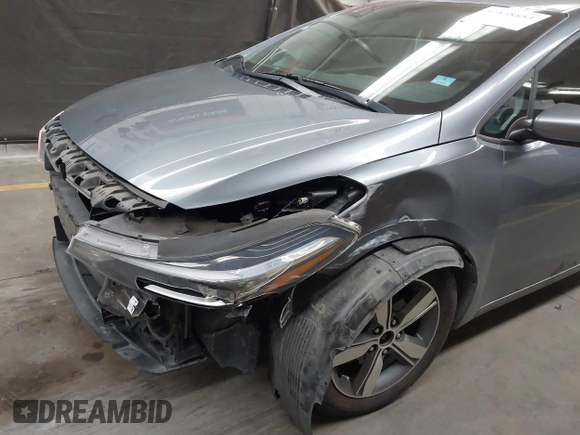 2018 Kia Forte LX with VIN 3KPFL4A76JE210647, listed as a IAAI auction lot 41838853 with 148,488 mi miles and . Bid and sale history available at DreamBid. Image 6.