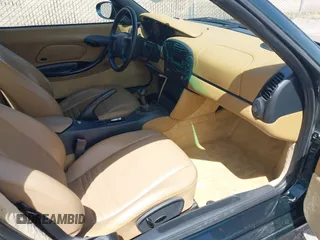 1999 Porsche Boxster with VIN WP0CA2986XU627495, listed as a IAAI auction lot 42112724 with 94,090 mi miles and . Bid and sale history available at DreamBid. Image 5.