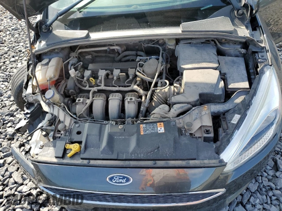 2016 Ford Focus SE z VIN 1FADP3F24GL313333, wystawiony jako Copart lot #60023715 z przebiegiem Nie podano mil oraz Szkoda całkowita • Salvage title. Historia ofert i sprzedaży dostępna na DreamBid. Obrazek 11.