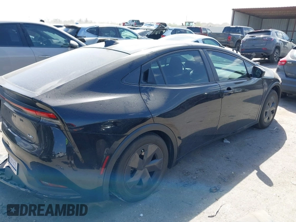 2023 Toyota Prius LE with VIN JTDACAAUXP3008201, listed as a IAAI auction lot 41824469 with 27,864 mi miles and . Bid and sale history available at carsss.com. Image 4.