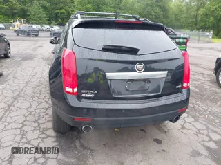 2013 Cadillac SRX Performance Collection z VIN 3GYFNHE39DS642111, wystawiony jako IAAI lot #42470291 z przebiegiem 176 239 mil mil oraz . Historia ofert i sprzedaży dostępna na DreamBid. Obrazek 16.
