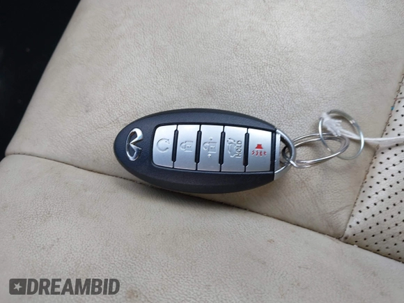 2015 Infiniti QX60 with VIN 5N1AL0MM8FC520975, listed as a IAAI auction lot 42261719 with 125,732 mi miles and . Bid and sale history available at DreamBid. Image 11.