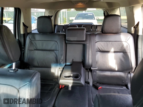 2014 Ford Flex Limited z VIN 2FMGK5D89EBD10509, wystawiony jako Copart lot #57614265 z przebiegiem 174 650 mil mil oraz Szkoda całkowita • Salvage title. Historia ofert i sprzedaży dostępna na DreamBid. Obrazek 10.