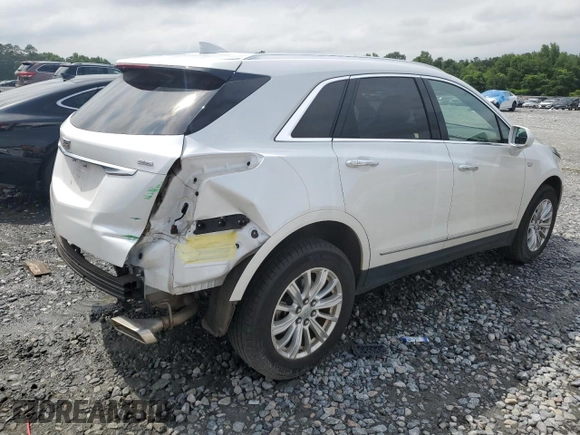 2018 Cadillac XT5 FWD with VIN 1GYKNARS1JZ222767, listed as a Copart auction lot 57989015 with 33,464 mi miles and Salvage title. Bid and sale history available at DreamBid. Image 3.