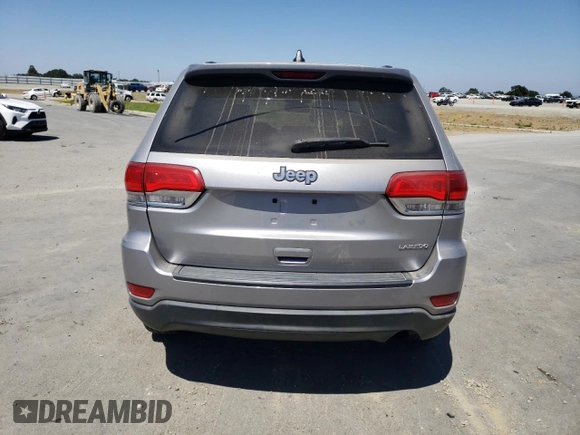 2016 Jeep Grand Cherokee Laredo with VIN 1C4RJEAGXGC358910, listed as a Copart auction lot 61499455 with 86,054 mi miles and Salvage title. Bid and sale history available at DreamBid. Image 6.