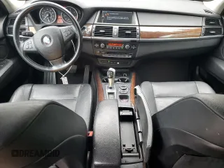 2012 BMW X5 35d with VIN 5UXZW0C54CL671377, listed as a Copart auction lot 60936395 with 105,903 mi miles and Salvage title. Bid and sale history available at DreamBid. Image 8.