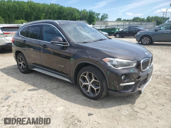 2017 BMW X1 xDrive28i z VIN WBXHT3C39H5F72979, wystawiony jako Copart lot #56003625 z przebiegiem 101 184 mil mil oraz Szkoda całkowita • Salvage title. Historia ofert i sprzedaży dostępna na DreamBid. Obrazek 4.