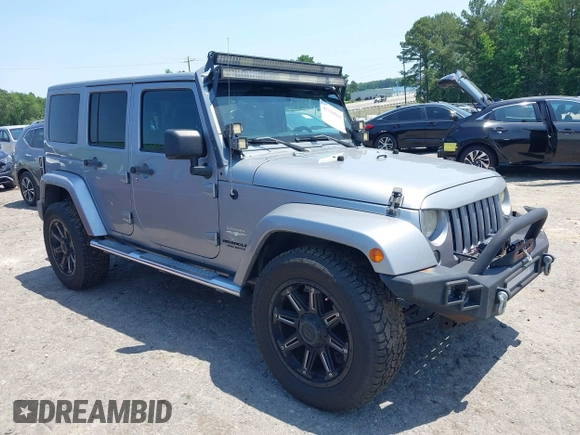 2013 Jeep Wrangler Unlimited Sahara with VIN 1C4BJWEG4DL666930, listed as a IAAI auction lot 42310569 with 206,577 mi miles and . Bid and sale history available at DreamBid. Image 1.