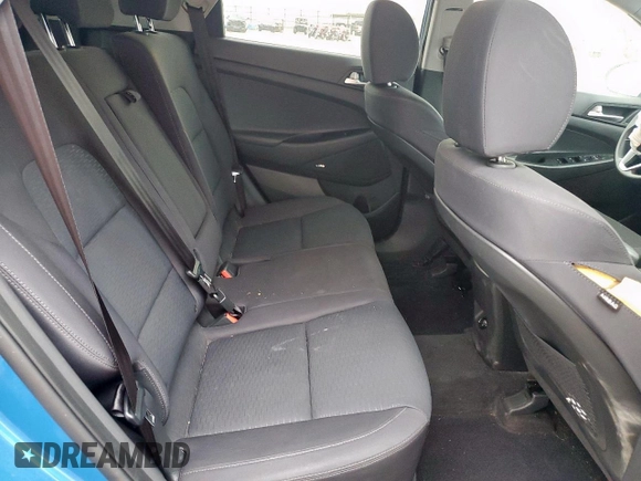 2019 Hyundai Tucson Sport z VIN KM8J33AL5KU861199, wystawiony jako Copart lot #55126555 z przebiegiem 75 432 mil mil oraz Szkoda całkowita • Salvage title. Historia ofert i sprzedaży dostępna na DreamBid. Obrazek 11.