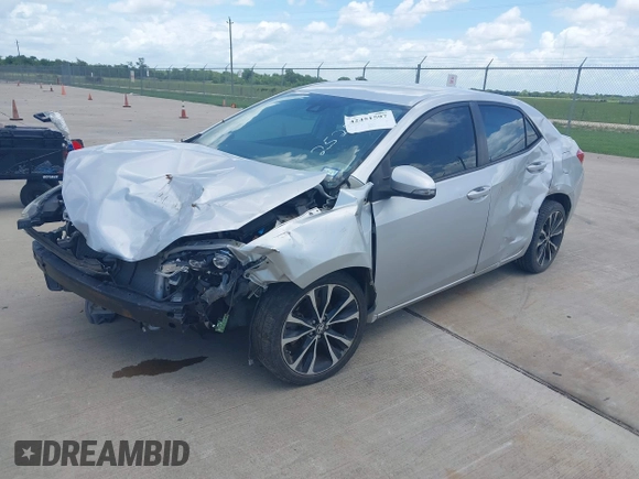 2017 Toyota Corolla L z VIN 5YFBURHE4HP732912, wystawiony jako IAAI lot #42451597 z przebiegiem 73 901 mil mil oraz . Historia ofert i sprzedaży dostępna na DreamBid. Obrazek 17.