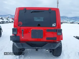 2015 Jeep Wrangler Unlimited Rubicon with VIN 1C4BJWFG7FL646463, listed as a IAAI auction lot 41537553 with 97,412 mi miles. Bid and sale history available at carsss.com. Image 16.