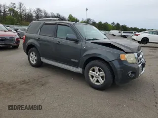 2008 Ford Escape Hybrid с VIN 1FMCU59HX8KE10307, выставлен на аукционе Copart как лот 58074825 с пробегом 165 479 миль миль и Списание • Salvage title. История ставок и продаж доступна на DreamBid. Изображение 4.