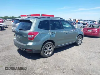 2016 Subaru Forester Touring with VIN JF2SJAVCXGH490507, listed as a IAAI auction lot 42070715 with 98,456 mi miles and . Bid and sale history available at DreamBid. Image 4.