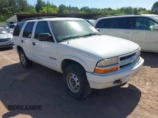 2003 Chevrolet Blazer LS z VIN 1GNDT13X53K152850, wystawiony jako IAAI lot #41982795 z przebiegiem 261 155 mil mil oraz . Historia ofert i sprzedaży dostępna na DreamBid. Obrazek 1.