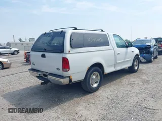 2000 Ford F-150 XL with VIN 1FTZF1720YNB37392, listed as a IAAI auction lot 42460974 with Not provided miles and . Bid and sale history available at DreamBid. Image 4.