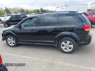 2013 Dodge Journey American Value with VIN 3C4PDCAB2DT502182, listed as a IAAI auction lot 42074092 with 151,997 mi miles and . Bid and sale history available at DreamBid. Image 14.