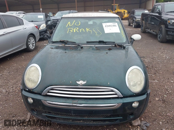 2006 MINI Hardtop with VIN WMWRC33506TK73564, listed as a IAAI auction lot 42602486 with 156,459 mi miles and . Bid and sale history available at DreamBid. Image 6.