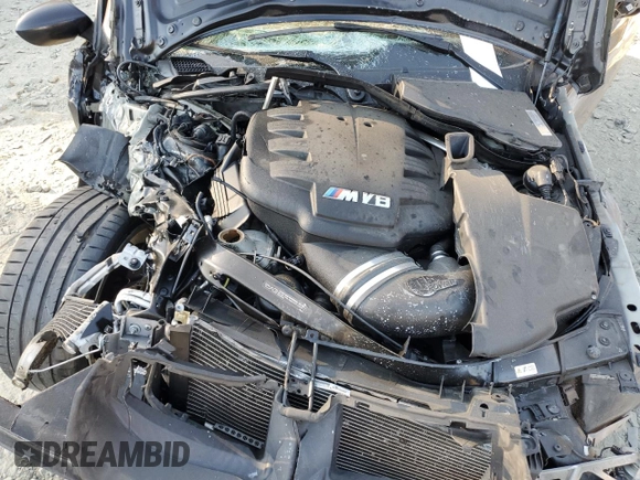 2012 BMW M3 with VIN WBSKG9C53CE797862, listed as a Copart auction lot 77396214 with 77,077 mi miles and Salvage title. Bid and sale history available at DreamBid. Image 12.
