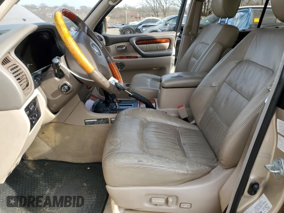 2002 Lexus LX 470 z VIN JTJHT00W323520240, wystawiony jako Copart lot #46495595 z przebiegiem 187 788 mil mil oraz Szkoda całkowita • Salvage title. Historia ofert i sprzedaży dostępna na DreamBid. Obrazek 7.