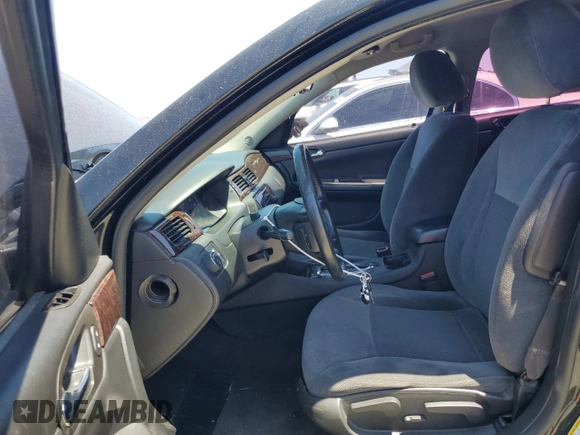 2014 Chevrolet Impala LS z VIN 2G1WA5E37E1173896, wystawiony jako Copart lot #57906265 z przebiegiem 147 887 mil mil oraz Czysty tytuł • Clean title. Historia ofert i sprzedaży dostępna na DreamBid. Obrazek 7.