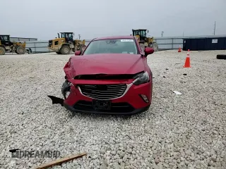 2017 Mazda CX-3 Grand Touring z VIN JM1DKFD79H0162503, wystawiony jako Copart lot #44717205 z przebiegiem 102 013 mil mil oraz Szkoda całkowita • Salvage title. Historia ofert i sprzedaży dostępna na DreamBid. Obrazek 11.