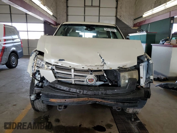 2007 Cadillac Escalade z VIN 1GYFK63837R139595, wystawiony jako Copart lot #54516945 z przebiegiem 144 003 mil mil oraz Szkody całkowita. Historia ofert i sprzedaży dostępna na DreamBid. Obrazek 5.