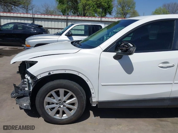 2014 Mazda CX-5 Touring with VIN JM3KE2CY2E0426164, listed as a IAAI auction lot 41812932 with 186,015 mi miles. Bid and sale history available at carsss.com. Image 18.