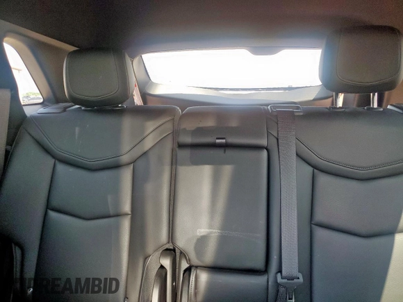 2021 Cadillac XT5 AWD Luxury z VIN 1GYKNBR44MZ162883, wystawiony jako Copart lot #59623725 z przebiegiem 50 006 mil mil oraz Szkoda całkowita • Salvage title. Historia ofert i sprzedaży dostępna na DreamBid. Obrazek 10.