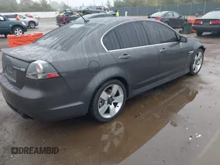 2009 Pontiac G8 GT z VIN 6G2EC57Y19L203150, wystawiony jako IAAI lot #42314747 z przebiegiem 130 188 mil mil oraz . Historia ofert i sprzedaży dostępna na DreamBid. Obrazek 4.